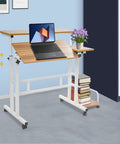 Effortless Folding Standing Desk With Smooth Rolling Casters And Tilted Writing Panels For Total Flex Work From Home Setup Featuring Quick Height Adjustments In Modern Light Walnut And White with laptop and books.