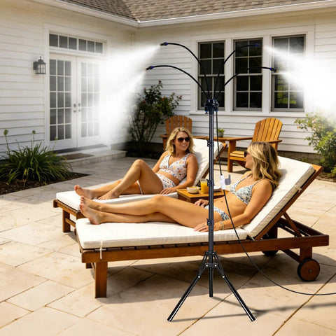 Outdoor Patio Misting System With Adjustable Five Point Seven Five Foot Spray Stand Twenty Six Point Five Foot Water Supply Line Portable Outdoor Mister For Cooling On Patios Yards BBQs Pools Beaches And Tanning with two women lounging on patio chairs