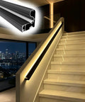 Transform Your Space With This Game Changing Indoor Aluminum Railing Kit Featuring Smart Motion Sensor Activated Led Lights And Heavily Reinforced 1.4 Millimeter Bars For Stairs Balconies Decks And Super Slick Home Upgrades, black railing with LED lights beside white stairs.