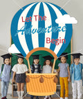 Children posing with Epic 78 Inch Hot Air Balloon Photo Booth Frame Travel Theme Selfie Prop for parties and school events.