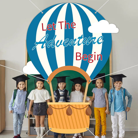 Children posing with Epic 78 Inch Hot Air Balloon Photo Booth Frame Travel Theme Selfie Prop for parties and school events.