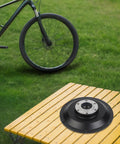 Built Tough Aluminum Alloy E Bike Motor Side Cover With Six Hole Disc Brake Compatible Hub End Cap Plus Reliable 6003 Bearing Kit on a table.