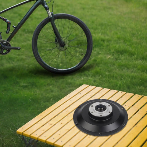 Built Tough Aluminum Alloy E Bike Motor Side Cover With Six Hole Disc Brake Compatible Hub End Cap Plus Reliable 6003 Bearing Kit on a table.