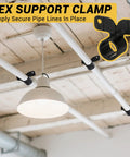 Pex support clamps set on white ceiling pipes; black nylon R-type clamps near a pendant light.