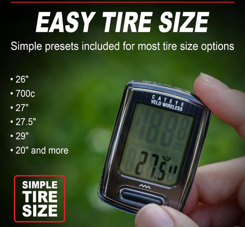 Hand holding Velo Wireless Bike Computer with tire size display and features like real time speed, sleek black design.