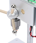 Close-up view of the Jiawu Mini Benchtop Drill Press with 0.3-4mm JT0 chuck and variable speed control features.