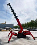 Compact Mini Crawler Crane with 360 Degree Rotation and Multi Stage Boom Portable Hydraulic Lift on job site outdoors
