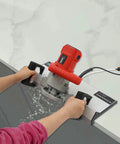 Heavy Duty Electric Tile Bevel Cutter And Chamfering Tool Fueled By A Beefy 1200 Watt Motor in use cutting tile edges.