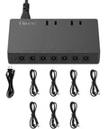 7 Way Isolated Guitar Pedal Power Supply With 9V 100mA Ports For Six Pedals And 9V 300mA Port For One, shown with cables