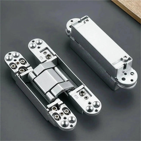 Badass Concealed Hidden Door Hinges With Rock Solid 180 Degree Adjustable Movement And A Zero Drama 80 Kilogram Load Rating For Quick Wood Door Installation In Sleek Black, showing two black steel hinges.