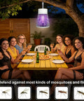 Group of women dining outdoors under Rechargeable 2 In 1 Bug Zapper Lamp For Indoor Outdoor Use, Wireless Mosquito Killer.