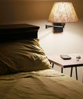 Cambridge 15 Inch Modern Sleek Swing Arm Wall Sconce With Latte Mocha Empire Fabric Shade by a bedroom nightstand