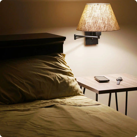 Cambridge 15 Inch Modern Sleek Swing Arm Wall Sconce With Latte Mocha Empire Fabric Shade by a bedroom nightstand