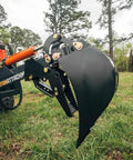 Mechanical Backhoe Thumb Attachment For Excavators Bolt On 5 Position Adjustable Thumb Heavy Duty Boom in grassy field