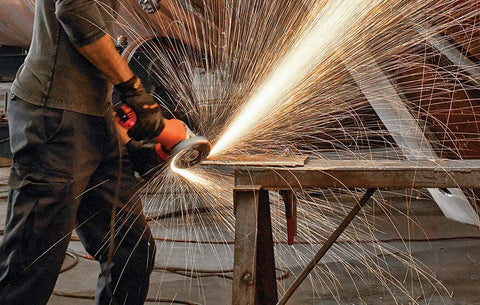 Person using Heavy Duty 6 Inch Grinding Wheel Pack Of 25 For Rough Grinding And Finishing Jobs With Threaded Arbor Mount on metal.