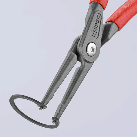 Knipex Internal Precision Snap Ring Pliers Go To Pro Grade Tool For Internal Circles, heavy-duty with red grips, holding a snap ring.