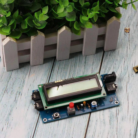 Ham Radio Essential CW Decoder Morse Code Reader And Translator with LCD Display and plug and play setup on wooden surface