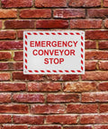 Built Tough Osha Emergency Conveyor Stop Sign Heavy Duty Weatherproof Plastic For Indoor Or Outdoor Use Uv Resistant Wall Mounted Industrial Safety Placard No Sweat Installation With Bold Warning Markings on brick wall.