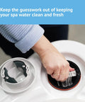 Smart Water Monitor For Spas And Hot Tubs With Salt System Support, Hourly Testing, And Effortless Monitoring To Keep Your Water Clean, Natural Feeling, And Ready For Relaxing Soaks, white unit being installed