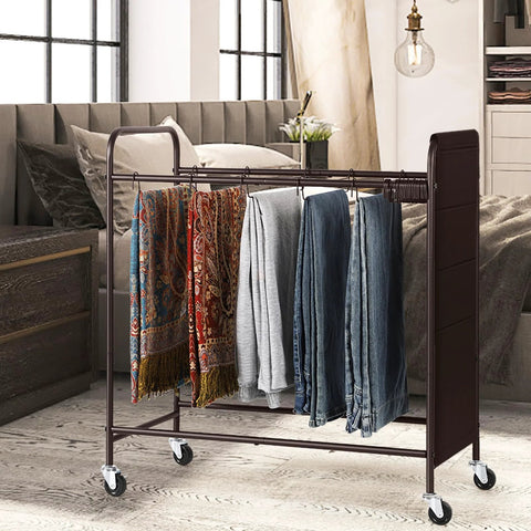 Four Wheel Pants Rack With 30 Hangers And Built In Oxford Bag for Small Items displayed in a bedroom with jeans and skirts hanging.