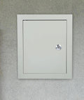 Weatherproof Outdoor Electrical Junction Box With Beefy Rugged Iron Enclosure And Mounting Plate on gray wall