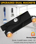 Black dual magnet clamp against magnetic board with badges, showing strong hold capacity.