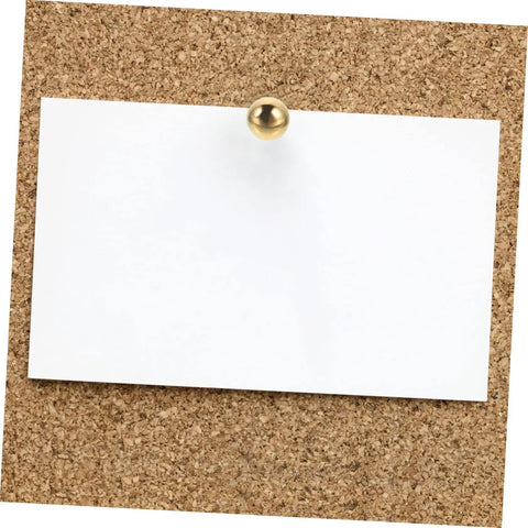 Corkboard with a note pinned using a brass tack from the 200Pcs DIY Craft Nails For Wall Hangings And Scrapbooking Kit.