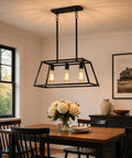 Matte Black Kitchen Island Lighting Fixture With Three Lights Farmhouse Style Pendant Chandelier in dining room setting