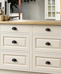Kitchen island with Three Inch Cup Drawer Pulls Set Of Five In Flat Black Modern Kitchen Cabinet Handles Hardware installed.