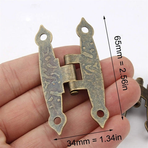 Close-up of Antique Bronze Cabinet Hinges Set 65x34mm, 20 Pieces, 4 Holes, With Screws in hand, showing size.