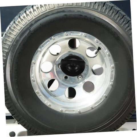Spare Tire Bolt And Retainer Clamp For Cars And Trucks No-Fuss Easy Install Wheel Replacement Part Built Tough To Keep Your Spare From Bouncing And Rattling, close-up view of a secured tire on a vehicle.