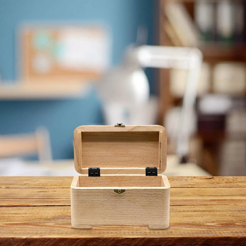 Wooden box with 20 Piece Iron Cabinet Hinges For Wooden Boxes With Six Hole Mounting shown open on a wooden table.