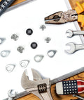 Durable Carbon Steel Bike Hub Nut And Safety Washer Kit With M8 M9.5 M10 laid out with tools for bikes