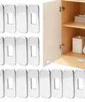 Ultra Thin Magnetic Cabinet Door Latches Hold Super Tight With Heavy Duty Adhesive For Kitchen, Bathroom & RV Cabinets Without Drilling Any Holes No Installation Hassle At All In This 12 Pack Set silver finish showcased with cabinets.