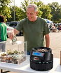 Heavy Duty US Coin Counter Sorter And Wrapper Machine Handles 5 Denominations in use at an outdoor event.