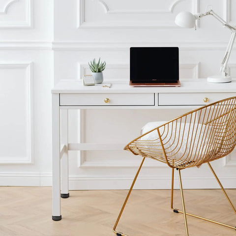 White desk with metal chair on hardwood floor in office using Heavy Duty 8 Pack 3/8-16 Threaded Furniture Levelers With Adjustable Feet.