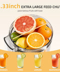Keerain Automatic Electric Citrus Juicer With Dual Cones, One Touch Easy Operation Machine High Yield For Oranges Lemons Grapefruit Watermelon Compact Countertop Home Kitchen Appliance with fruits in large feed chute.