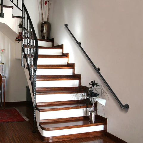 Heavy Duty Industrial Staircase Handrails Nine Feet Long Cut From Solid Galvanized Steel Pipe For Serious Corrosion Protection And Totally Hassle Free No Sweat Railing Setup At Home Today mounted on a wooden staircase.