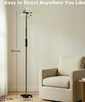 Crazy Bright LED Floor Lamp With Stepless Dimming And Remote Control, 69 Inch Torchiere Corner Lamp shown next to an armchair.