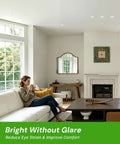 YOVELOS 6-Pack 10W Trimless Recessed LED 3 Inch Slim Spotlight illuminating a cozy living room with a woman relaxing on a couch.