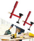20mm Red Aluminum Bench Dog Clamp Set For Woodworking And MFT Workbench With Protective Pads All Metal Construction Knurled Rod For Strong Down Pressure shown with woodworking tools on a bench.