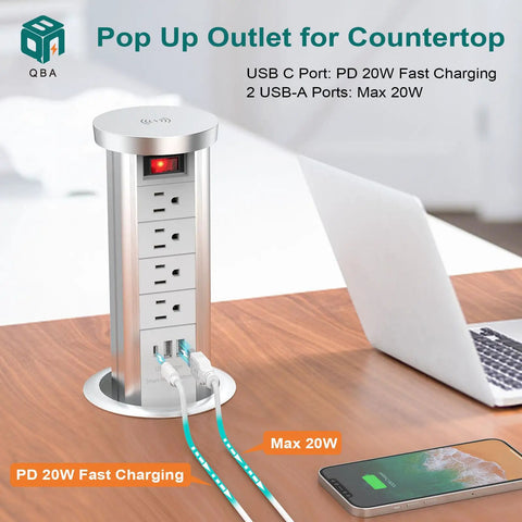 Pop Up Power Outlet With Wireless Charging Station on countertop, showing three AC plugs, two USB ports, in use with charging cables.