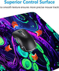 Close-up of Neon Cthulhu Monster Extended Desk Pad For Gaming And Work, Extra Large 31.5 By 11.8 Inches, with mouse on vibrant design