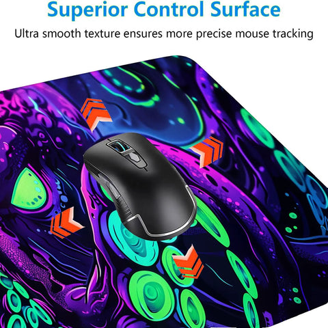 Close-up of Neon Cthulhu Monster Extended Desk Pad For Gaming And Work, Extra Large 31.5 By 11.8 Inches, with mouse on vibrant design