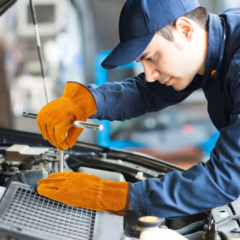 Mechanic wearing 12 Pairs Leather Work Gloves With Flexible Grip For Gardening And Construction Men And Women Cowhide Thorn Proof