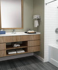 Bathroom with Colony Pro Single Handle Bathroom Sink Faucet With Metal Drain 1.2 GPM Polished Chrome on wooden vanity.