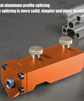 Heavy Duty Aluminum Profile Drill Guide And Extrusion Cutting Jig showing orange aluminum body with brass knobs for precise metal drilling.