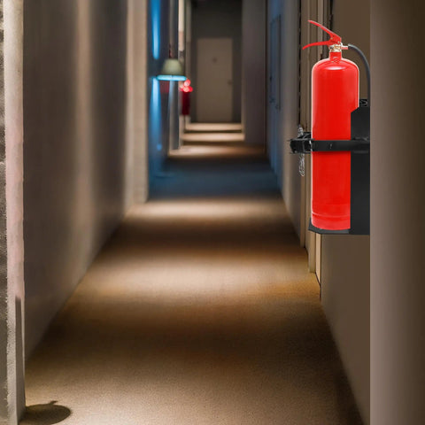 Heavy Duty Wall Mount Fire Extinguisher Bracket For 10lb Dry And 5lb CO2 Extinguishers installed in hallway, metal holder visible