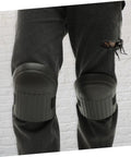 Ride Easy Construction Knee Pads With Non Slip Work Floor Pads for Men and Women, shown on black pants, ideal for gardening.