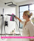 Woman using Heavy Duty Pressurized Handheld Steam Cleaner With 12 Piece Attachment Kit in bathroom, blasting grout stains with steam.